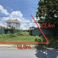 Bán đất mặt tiền đường QL1A, ngang 19m.